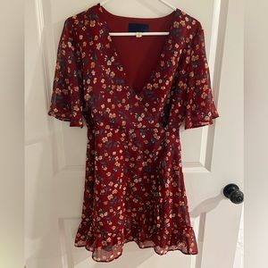 Francesca’s ruffle hem wrap dress